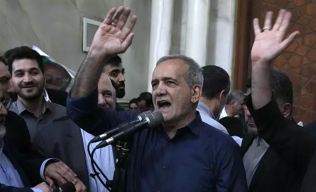 Iran's President-elect Masoud Pezeshkian speaks in a meeting a day after the presidential election, at the shrine of the late revolutionary founder Ayatollah Khomeini, just outside Tehran, Iran, Saturday, July 6, 2024. (AP Photo/Vahid Salemi)