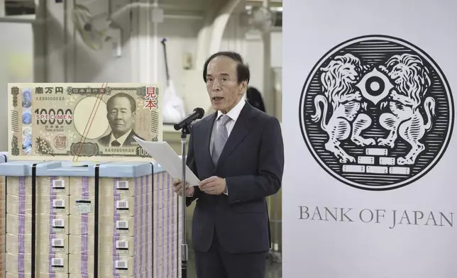 Bank of Japan Governor Kazuo Ueda delivers a speech during a ceremony to unveil new banknotes at the BOJ headquarters in Tokyo, Japan, Wednesday, July 3, 2024. (Japan Pool/Kyodo News via AP)