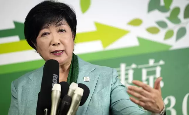 FILE - Incumbent Tokyo Gov. Yuriko Koike delivers a speech after she was elected for Tokyo's gubernatorial election in Tokyo, Sunday, July 7, 2024. Multiple women competing for a top political office is still rare in Japan, but Koike’s win highlights a gradual rise in powerful female officials and a society more open to gender balance in politics. That said, even if a woman eventually becomes prime minister, politics here is still overwhelmingly dominated by men, and experts see a huge effort needed for equal representation. (AP Photo/Hiro Komae, File)