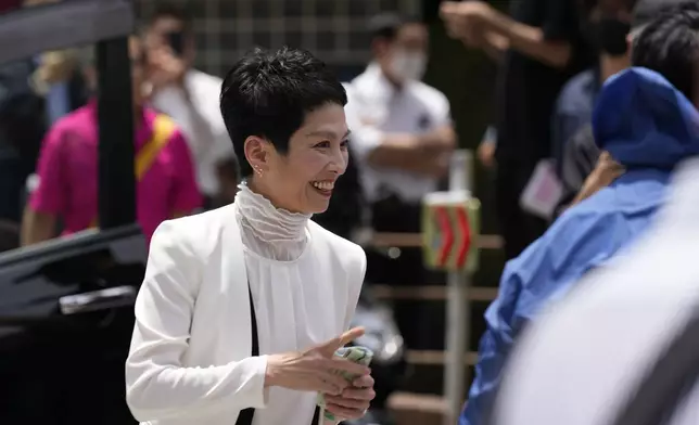 Renho, a Tokyo gubernatorial election candidate and a member of the House of Councilors, shows up for her Tokyo gubernatorial election campaign in Tokyo, Thursday, June 20, 2024. Renho told reporters in June that she often saw headlines about the Tokyo governor's race that trumpeted "A battle of dragon women". "Would you use that kind of expression to describe a competition between male candidates?" she asked. (AP Photo/Hiro Komae)