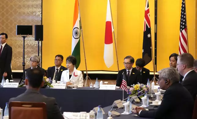 Japanese Foreign Minister Yoko Kamikawa, center left, presides the Quad Ministerial Meeting at the Foreign Ministry's Iikura guesthouse in Tokyo, Monday, July 29, 2024. (AP Photo/Shuji Kajiyama)