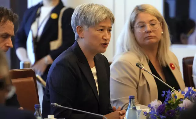 Australian Foreign Minister Penny Wong, center, attends the Quad Ministerial Meeting at the Foreign Ministry's Iikura guesthouse in Tokyo, Monday, July 29, 2024. (AP Photo/Shuji Kajiyama)