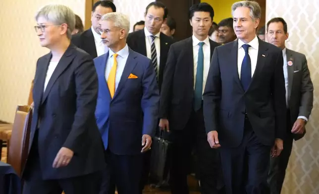 Australian Foreign Minister Penny Wong, left, Indian External Affairs Minister Subrahmanyam Jaishankar, second left, and U.S. Secretary of State Antony Blinken, second right, arrive for the Quad Ministerial Meeting, at the Foreign Ministry's Iikura guesthouse in Tokyo, Monday, July 29, 2024. (AP Photo/Shuji Kajiyama)