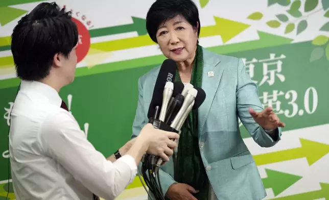 Incumbent Tokyo Gov. Yuriko Koike delivers speech after she was elected for Tokyo's gubernatorial election in Tokyo, Sunday, July 7, 2024. (AP Photo/Hiro Komae)