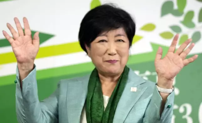 Incumbent Tokyo Gov. Yuriko Koike celebrates after she was elected for Tokyo's gubernatorial election in Tokyo, Sunday, July 7, 2024. (AP Photo/Hiro Komae)