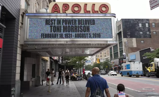 FILE - The marquee of the Apollo Theater honors, Aug. 6, 2019 in New York. The 47th Kennedy Center class will be honored with an evening of tributes, testimonials and performances on Dec. 8 at Washington's John F. Kennedy Center for the Performing Arts. (AP Photo/Mark Lennihan, File)