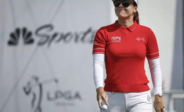 Australia's Hannah Green reacts to her putt on the eighteenth hole during the second round at the LPGA Canadian Women's Open golf tournament in in Calgary, Alberta, Friday, July 26, 2024. (Jeff McIntosh /The Canadian Press via AP)