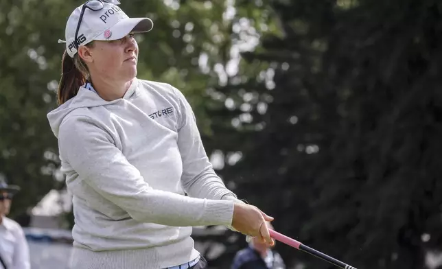 Jennifer Kupcho, of the United States, watches her tee shot on the fifteenth hole during the second round at the LPGA Canadian Women's Open golf tournament in in Calgary, Alberta, Friday, July 26, 2024. (Jeff McIntosh /The Canadian Press via AP)