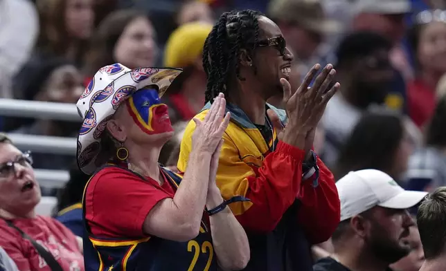 Indiana Fever fans cheer during the second half of a WNBA basketball game against the New York Liberty, Saturday, July 6, 2024, in Indianapolis. Indiana won 83-78. (AP Photo/Darron Cummings)