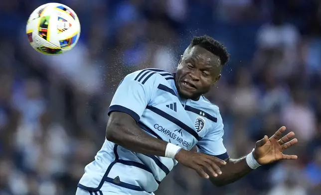 Sporting Kansas City attacker Willy Agada passes the ball during the second half of an MLS soccer match against FC Dallas Sunday, July 7, 2024, in Kansas City, Kan. Sporting Kansas City won 3-2. (AP Photo/Charlie Riedel)