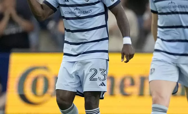 Sporting Kansas City attacker Willy Agada celebrates after scoring a goal during the first half of an MLS soccer match against FC Dallas Sunday, July 7, 2024, in Kansas City, Kan. (AP Photo/Charlie Riedel)