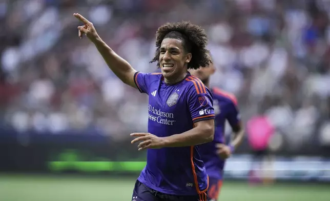 Houston Dynamo's Adalberto Carrasquilla celebrates after his goal against the Vancouver Whitecaps during the first half of an MLS soccer match in Vancouver, British Columbia, Saturday, July 20, 2024. (Darryl Dyck/The Canadian Press via AP)