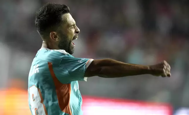 Inter Miami defender Jordi Alba reacts after scoring during the second half of an MLS soccer match against the Chicago Fire, Saturday, July 20, 2024, in Fort Lauderdale, Fla. (AP Photo/Lynne Sladky)