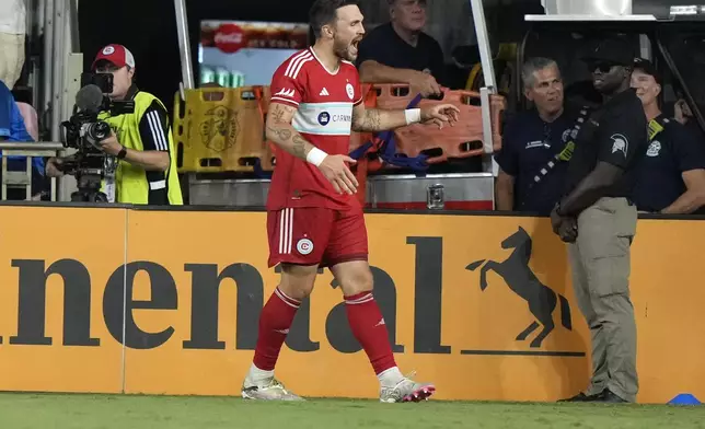 Chicago Fire defender Rafael Czichos (5) reacts after scoring a goal during the second half of an MLS soccer match against Inter Miami, Saturday, July 20, 2024, in Fort Lauderdale, Fla. (AP Photo/Lynne Sladky)