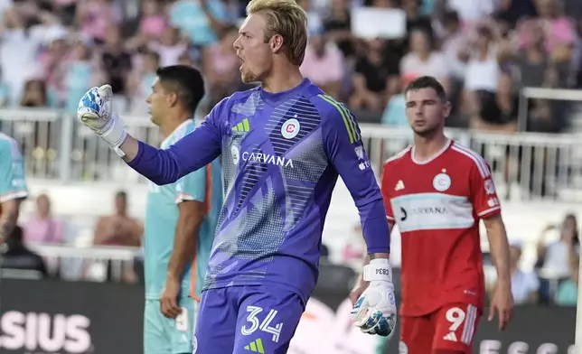 Chicago Fire goalkeeper Chris Brady (34) reacts during the first half of an MLS soccer match against Inter Miami, Saturday, July 20, 2024, in Fort Lauderdale, Fla. (AP Photo/Lynne Sladky)