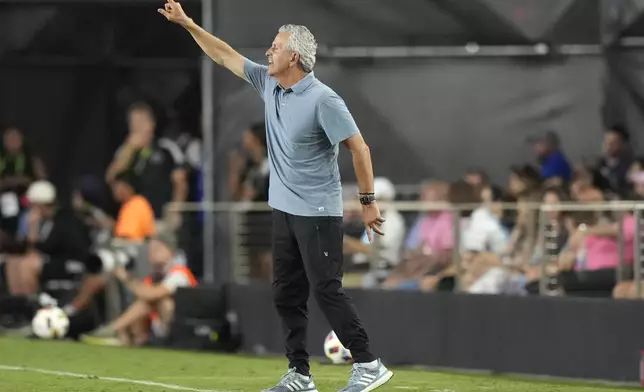 Chicago Fire head coach Frank Klopas watches during the second half of an MLS soccer match against Inter Miami, Saturday, July 20, 2024, in Fort Lauderdale, Fla. (AP Photo/Lynne Sladky)