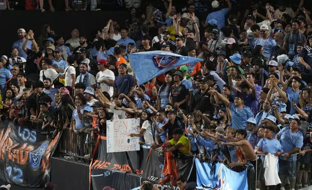 Fans cheer for New York FC after they defeated CF Montréal during an MLS soccer match, Wednesday, July 3, 2024, in New York. (AP Photo/Pamela Smith)