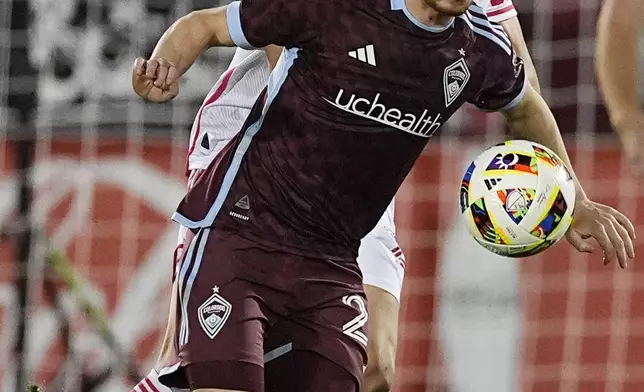 Colorado Rapids midfielder Connor Ronan, front, pursues the ball with St. Louis City forward Nökkvi Þórisson in the second half of a MLS soccer match Sunday, July 7, 2024, in Commerce City, Colo. (AP Photo/David Zalubowski)