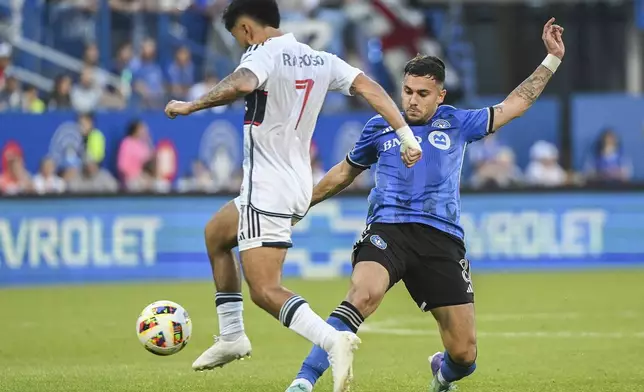 CF Montreal's Dominik Yankov, right, challenges Vancouver Whitecaps midfielder Ryan Raposo (7) during the first half of a MLS soccer game in Montreal, Saturday, July 6, 2024. (Graham Hughes/The Canadian Press via AP)