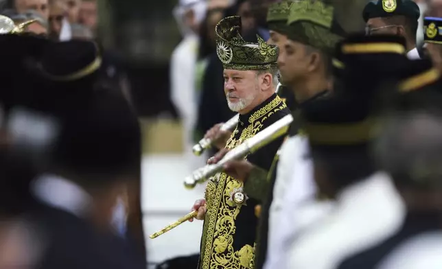 The 17th King of Malaysia, Sultan Ibrahim Iskandar, center, participates in his coronation at the National Palace in Kuala Lumpur, Malaysia, Saturday, July 20, 2024. (Hasnoor Hussain/Pool Photo via AP)