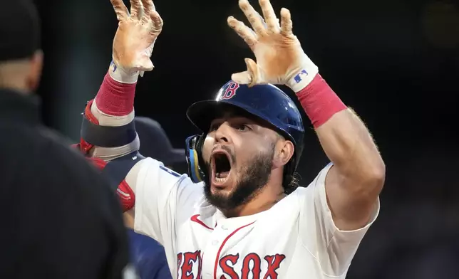 Boston Red Sox's Wilyer Abreu reacts after his RBI single during the third inning of a baseball game against the Seattle Mariners, Monday, July 29, 2024, in Boston. (AP Photo/Charles Krupa)