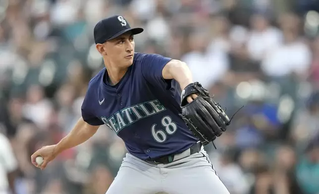 Seattle Mariners pitcher George Kirby delivers during the first inning of a baseball game against the Chicago White Sox, Friday, July 26, 2024, in Chicago. (AP Photo/Charles Rex Arbogast)