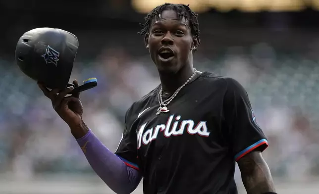 Miami Marlins' Jazz Chisholm Jr. reacts during the second inning of a baseball game against the Milwaukee Brewers, Friday, July 26, 2024, in Milwaukee. (AP Photo/Aaron Gash)