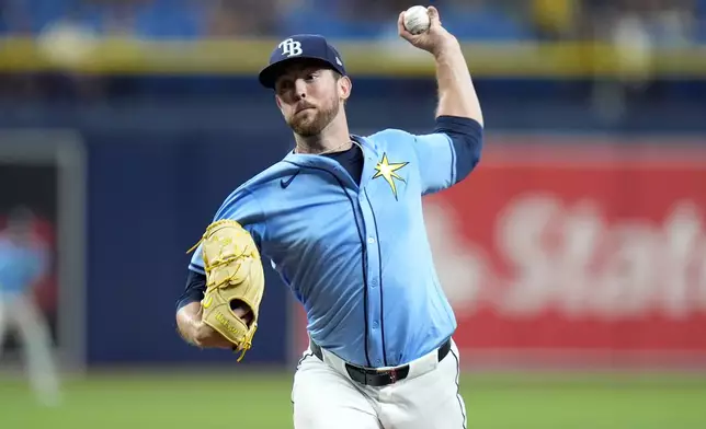 Tampa Bay Rays starting pitcher Jeffrey Springs delivers to the Miami Marlins during the first inning of a baseball game Tuesday, July 30, 2024, in St. Petersburg, Fla. (AP Photo/Christopher O'Meara)