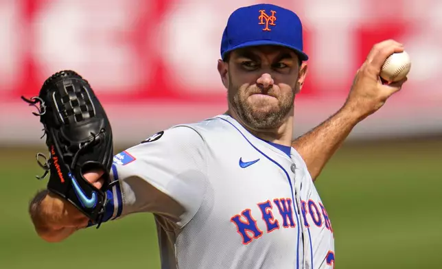 New York Mets starting pitcher David Peterson delivers during the first inning of a baseball game against the Pittsburgh Pirates in Pittsburgh, Saturday, July 6, 2024. (AP Photo/Gene J. Puskar)