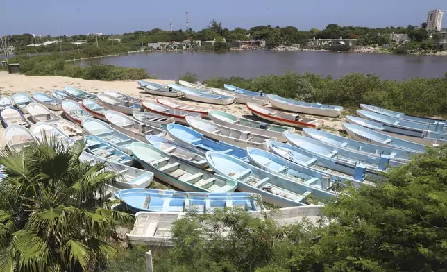 Boats lie on land for protection in preparation for the arrival of Hurricane Beryl in Progreso, Mexico, Thursday, July 4, 2024. (AP Photo/Martin Zetina)