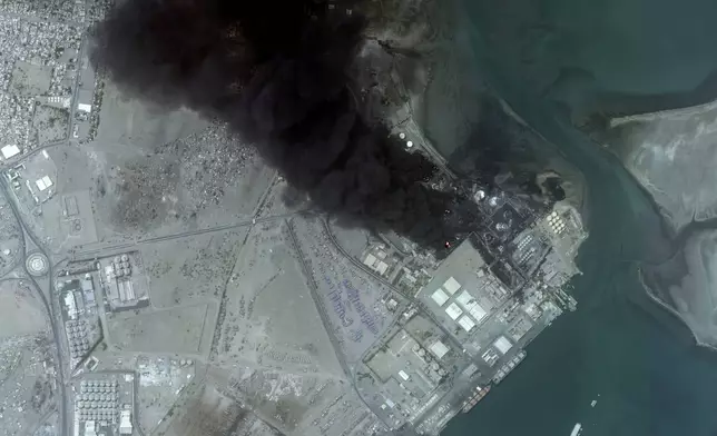 This satellite image provided by Maxar Technologies shows an overview of burning oil tanks in Hodeidah, Yemen, July 21, 2024. (Satellite image ©2024 Maxar Technologies via AP)