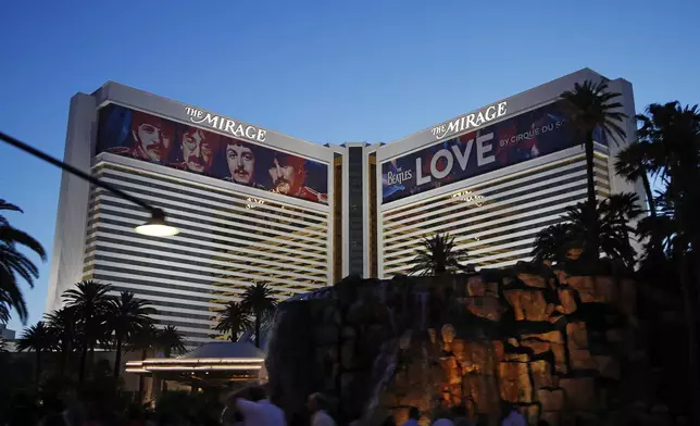 FILE - The Mirage Hotel and Casino is seen in Las Vegas, on May 3, 2018. Gambling ends Wednesday, July 17, 2024, and the doors will close at The Mirage, the iconic tropical island-themed Las Vegas Strip hotel-casino that sparked a resort building boom when it opened in 1989 but became overshadowed while Sin City converted from a desert gambling hub to a worldwide entertainment destination. (AP Photo/John Locher, File)