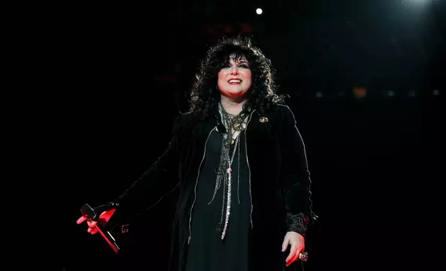 FILE - Ann Wilson, of the band Heart, performs onstage at the "Vh1 Divas Salute the Troops" on Friday, Dec. 3, 2010 in San Diego. Wilson says she has cancer. The band is postponing the remaining shows on its Royal Flush Tour. (AP Photo/Matt Sayles, File)