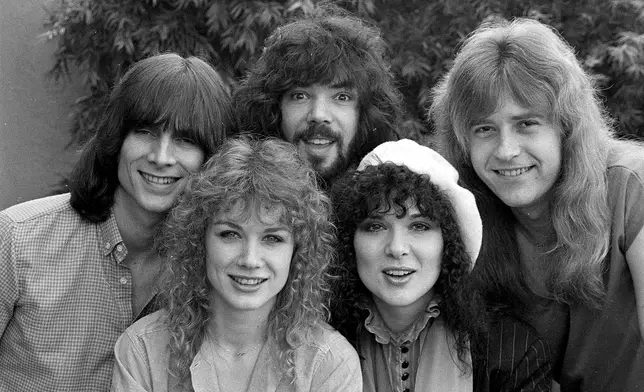 FILE - The rock group Heart, from left, Steve Fossen, Nancy Wilson, Michael Derosier, Ann Wilson and Howard Leese pose in Los Angeles on Feb. 19, 1980. Ann Wilson says she has cancer. The band is postponing the remaining shows on its Royal Flush Tour. (AP Photo, File)