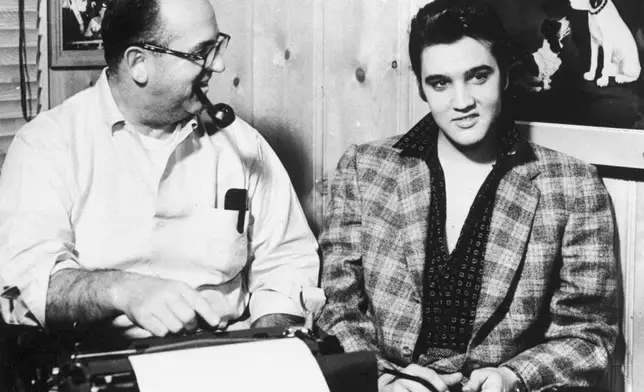 FILE - Tom Parker, left, of Madison, Tennessee, beams on protege Elvis Presley, January 7, 1957. Arthur Crudup wrote the song that became Elvis' first single, “That’s All Right," but received scant songwriting royalties in his lifetime. (The Tennessean via AP, File)
