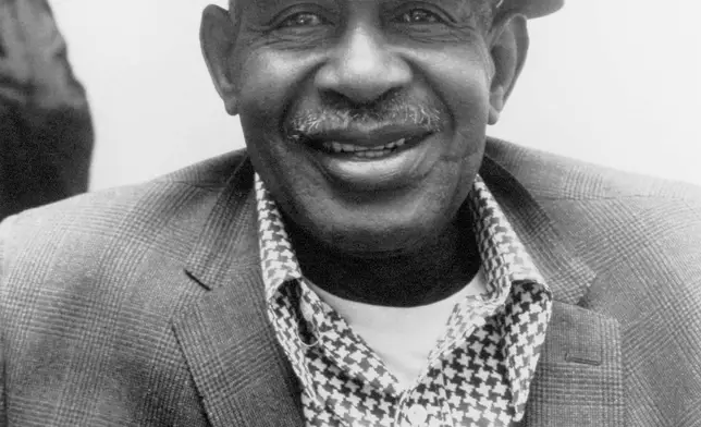 This image provided by the estate of Dick Waterman, shows Arthur Crudup, who wrote the song “That’s All Right,” which Elvis Presley later recorded for his first single. But Crudup received scant songwriting royalties because a record contract funneled the money to his original manager. Crudup died in 1974, leaving behind one of the starker accounts of Black-artist exploitation in the 20th Century. (Dick Waterman via AP)