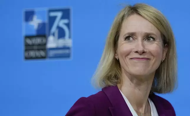 Estonia's Prime Minister Kaja Kallas smiles during her arrival at the NATO summit in Washington, Wednesday, July 10, 2024. (AP Photo/Matt Rourke)