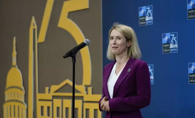 Estonia's Prime Minister Kaja Kallas speaking to members of the media at the NATO summit in Washington, Wednesday, July 10, 2024. (AP Photo/Matt Rourke)