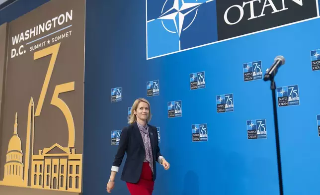 Estonia's Prime Minister Kaja Kallas prepares to speak during her arrival at the NATO summit in Washington, Thursday, July 11, 2024. (AP Photo/Mark Schiefelbein)