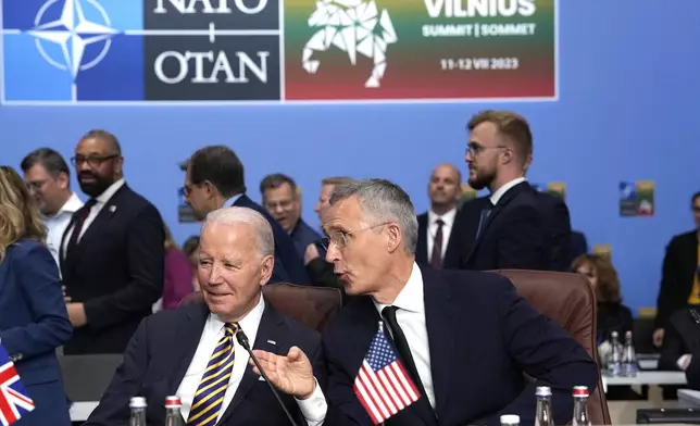 FILE - NATO Secretary General Jens Stoltenberg, right, speaks with United States President Joe Biden during a meeting of the NATO-Ukraine Council during a NATO summit in Vilnius, Lithuania, July 12, 2023. U.S. President Joe Biden and his NATO counterparts are meeting in Washington this week to mark the 75th anniversary of the world's biggest security organization just as Russia presses its advantage on the battlefield in Ukraine. (AP Photo/Pavel Golovkin, File)