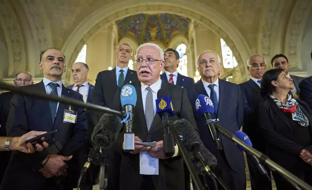 Palestinian foreign policy advisor Riad Malki speaks to media at the International Court of Justice, or World Court, in The Hague, Netherlands, Friday, July 19, 2024. The top U.N. court said Friday that Israel’s presence in the Palestinian occupied territories is “unlawful” and called on it to end and for settlement construction to stop immediately, issuing an unprecedented, sweeping condemnation of Israel’s rule over the lands it captured 57 years ago. (AP Photo/Phil Nijhuis)