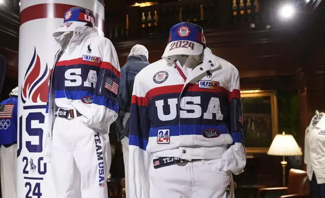 FILE - Team USA Paris Olympics attire is displayed at Ralph Lauren headquarters on Monday, June 17, 2024, in New York. (Photo by Charles Sykes/Invision/AP, File)