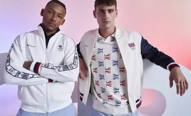 This image released by Ben Sherman shows British athletes Kye Whyte, left, and Jacob Peters wearing official Olympic team uniforms by Ben Sherman. (Ben Sherman via AP)