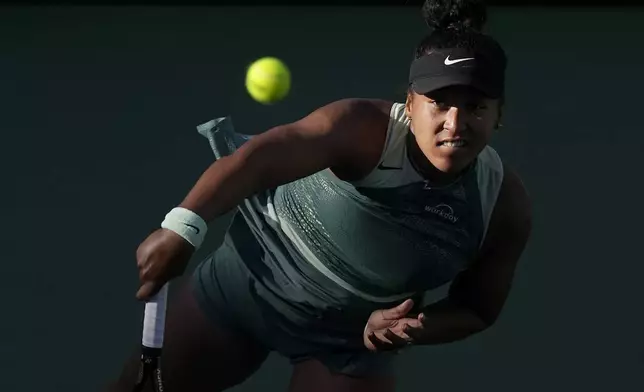 FILE - Naomi Osaka, of Japan, serves against Elise Mertens, of Belgium, at the BNP Paribas Open tennis tournament, Monday, March 11, 2024, in Indian Wells, Calif. (AP Photo/Mark J. Terrill, File)