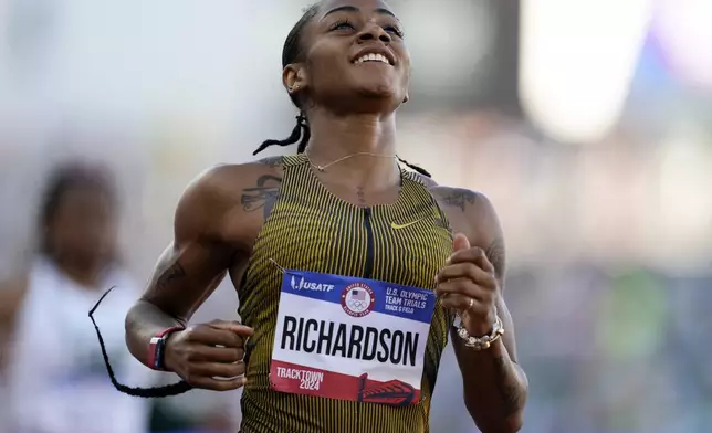 FILE - Sha'Carri Richardson wins a heat women's 200-meter semi-finals during the U.S. Track and Field Olympic Team Trials Friday, June 28, 2024, in Eugene, Ore. (AP Photo/George Walker IV, File)