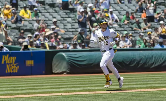 Oakland Athletics' Max Schuemann runs the bases after hitting a three-run home run against the Baltimore Orioles during the second inning of a baseball game Saturday, July 6, 2024, in Oakland, Calif. (AP Photo/John Hefti)