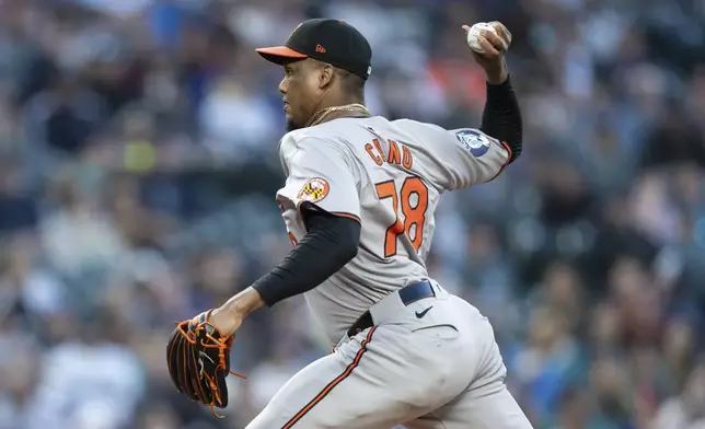 Baltimore Orioles reliever Yennier Cano delivers a pitch during the seventh inning of a game against the Seattle Mariners, Tuesday, July 2, 2024, in Seattle. (AP Photo/Stephen Brashear)
