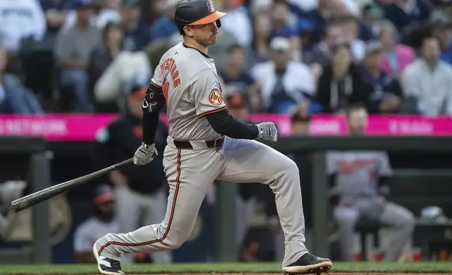 Baltimore Orioles' Jordan Westburg hits a RBI-single during the seventh inning of a baseball game against the Seattle Mariners, Tuesday, July 2, 2024, in Seattle. (AP Photo/Stephen Brashear)