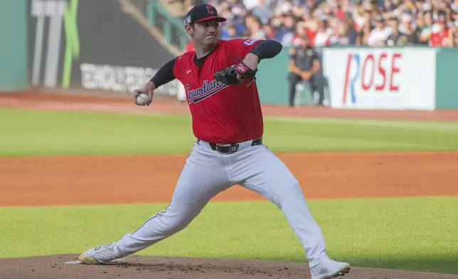 Cleveland Guardians starting pitcher Gavin Williams delivers against the San Diego Padres during the first inning of a baseball game in Cleveland, Saturday, July 20, 2024. (AP Photo/Phil Long)