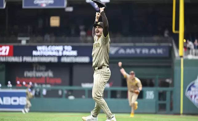 San Diego Padres starting pitcher Dylan Cease celebrates his no-hitter at the end of the ninth inning of a baseball game against the Washington Nationals, Thursday, July 25, 2024, in Washington. (AP Photo/John McDonnell)